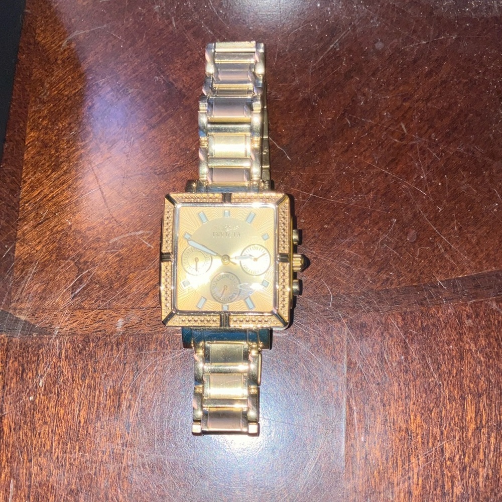 Invicta stainless steel gold watch